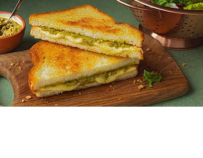 Raise the bar, a tad. Add pesto to your cheese toastie